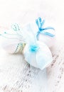 Easter Decoration. White Eggs with Blue Ribbons