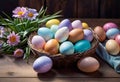 Easter decorations, colorfully painted and decorated Easter eggs and spring flowers on a wood background Royalty Free Stock Photo