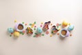 Easter decorative border made of festive elements Cookie cutters, sugar sprinkling, eggs. Top view with copy space. Sweet baking