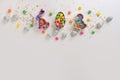 Easter decorative border made of festive elements Cookie cutters, sugar sprinkling, eggs. Top view with copy space. Sweet baking