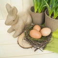 Easter decorative composition on a wooden background. Spring.
