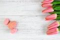Easter decorative eggs with tulips on a white background from boards. Royalty Free Stock Photo