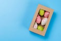 Easter delights: Colorful eggs in a gift box Royalty Free Stock Photo