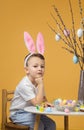 Easter. Easter concept. Boy decorate home for Easter holiday.