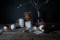 Easter. Easter night. Golden eggs and cakes on a wooden table. White feathers. Vintage. Dark background Royalty Free Stock Photo