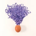 Easter egg with blue glitters