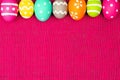 Easter egg border on pink Royalty Free Stock Photo