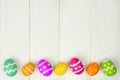 Easter egg border on white wood Royalty Free Stock Photo