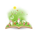 easter egg and buny funny spring with dandelion in the book Royalty Free Stock Photo