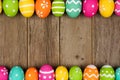Easter egg double border against rustic wood Royalty Free Stock Photo