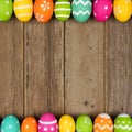 Easter egg double border against rustic wood Royalty Free Stock Photo