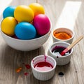 Easter Egg Dyeing Preparation with Colorful Eggs and Dyes Royalty Free Stock Photo