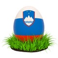 Easter egg with flag of Slovenia in the green grass, 3D rendering