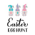 Easter egg hunt calligraphy hand lettering with cute gnomes holding eggs. Funny Easter quote typography poster. Vector template Royalty Free Stock Photo
