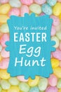 Easter Egg Hunt sign with candy eggs Royalty Free Stock Photo