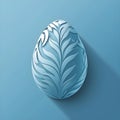 easter egg with a leaf pattern on a blue background Royalty Free Stock Photo