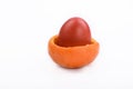 Easter egg in mandarin crust Royalty Free Stock Photo