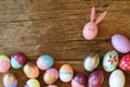 Easter egg painted into bunny face with long and fold ear, Easter holiday concept, fancy eggs Royalty Free Stock Photo