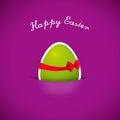 Easter egg in purple paper pocket. Royalty Free Stock Photo