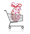 Easter egg in shopping cart for your design Royalty Free Stock Photo