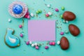 Easter egg, sweets and blank card. Royalty Free Stock Photo