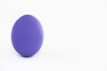 Easter egg of violet color very peri on a white background