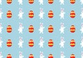 Easter egg and white rabbit seamless pattern on light blue background Royalty Free Stock Photo