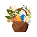 Happy Easter. Painted eggs in a basket with a bouquet of spring flowers on a white background. Royalty Free Stock Photo