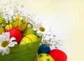 Easter eggs, baskets and the flowers Royalty Free Stock Photo