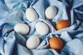 Easter eggs on blue textile draped background Royalty Free Stock Photo