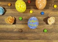 Easter eggs on a brown wooden Royalty Free Stock Photo