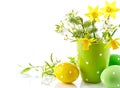 Easter eggs with bunch spring flowers narcissus Royalty Free Stock Photo