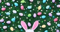 Easter eggs and candy with pink bunny ears Royalty Free Stock Photo