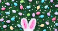 Easter eggs and candy with pink bunny ears Royalty Free Stock Photo