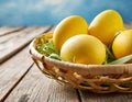 Easter eggs coloured in yellow. Easter basket Royalty Free Stock Photo