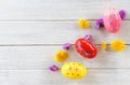 Easter eggs decoration with colorful flowers white wooden background Royalty Free Stock Photo