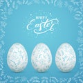 Easter eggs with decorative floral elements on blue background Royalty Free Stock Photo