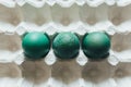 Easter eggs of different colors in tray Royalty Free Stock Photo