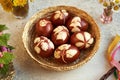 Easter eggs dyed with onion skins with a pattern of fresh plants Royalty Free Stock Photo