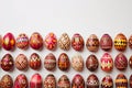 Easter eggs dyed using traditional methods visible on a white background.