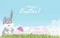 Easter eggs and easter bunny for decoration on fresh green grass