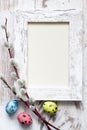 Easter eggs and empty vintage photo frame background Royalty Free Stock Photo