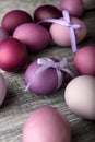 Easter eggs in fashionable colors on a gray wooden background Royalty Free Stock Photo