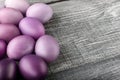 Easter eggs in fashionable colors on a gray wooden background Royalty Free Stock Photo