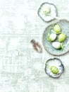 Easter eggs with feathers on ceramic plates Royalty Free Stock Photo