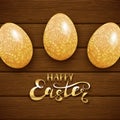 Easter eggs with floral pattern on brown wooden background Royalty Free Stock Photo