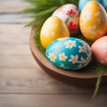 Easter eggs with flower on wood table background