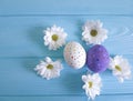 Easter eggs flowers rustic pattern blue wooden background place for text Royalty Free Stock Photo