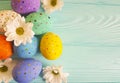 Easter eggs tradition flowers rustic pattern blue wooden background place for text Royalty Free Stock Photo