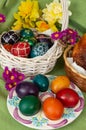 Easter eggs with flowers - green background